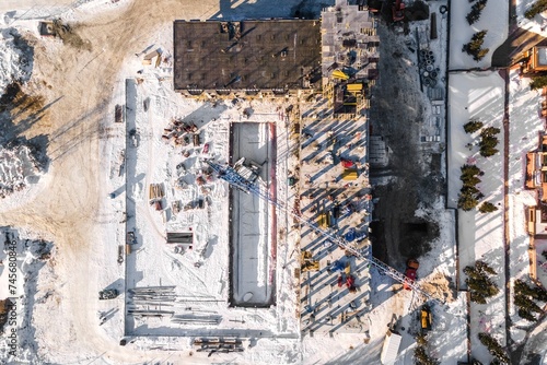 Photography the construction site of an apartment building in the winter from a height