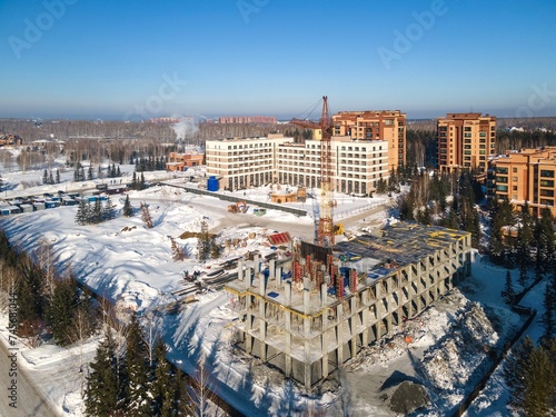 Photography the construction site of an apartment building in the winter from a height