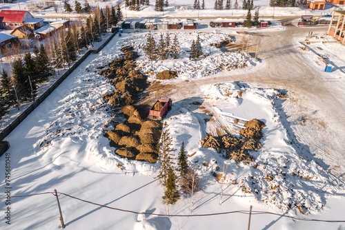 Photography the construction site of an apartment building in the winter from a height