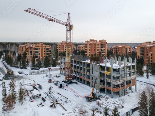 Canvas Print the construction site of an apartment building in the winter from a height