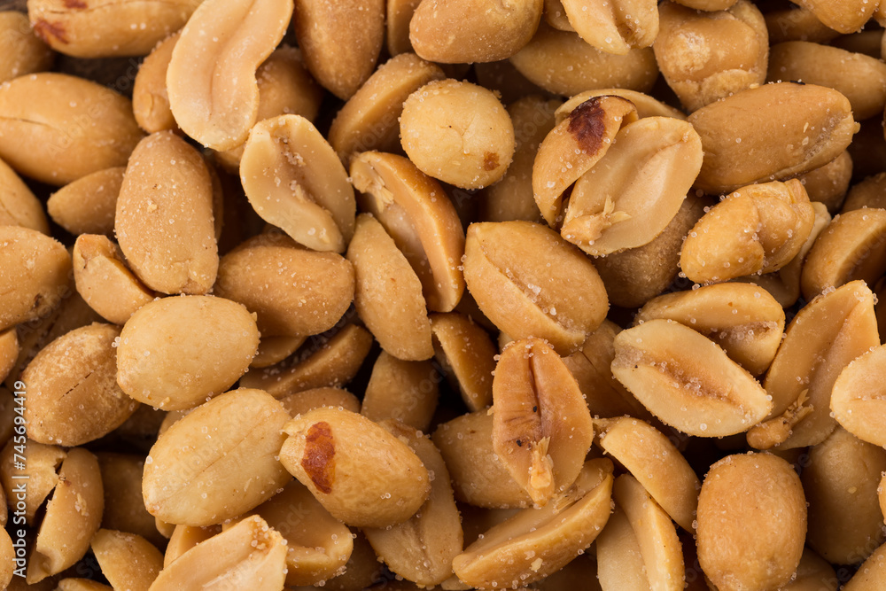 large amount of peeled salted peanuts large amount of peeled salted peanuts