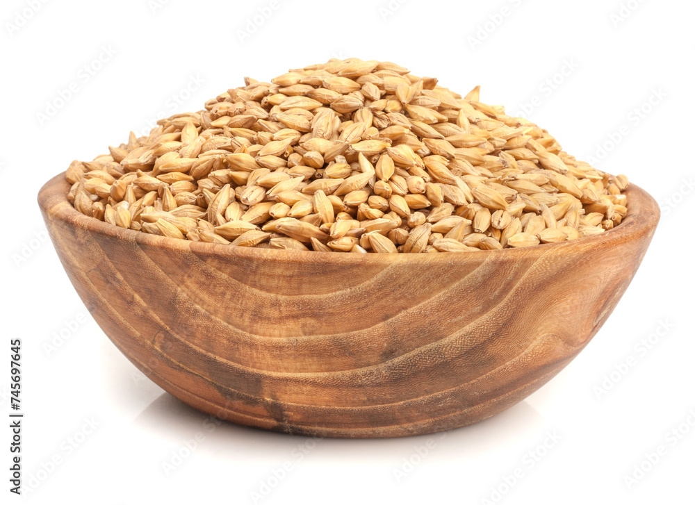 wooden cup of barley isolated on a white background wooden cup of barley isolated on a white background