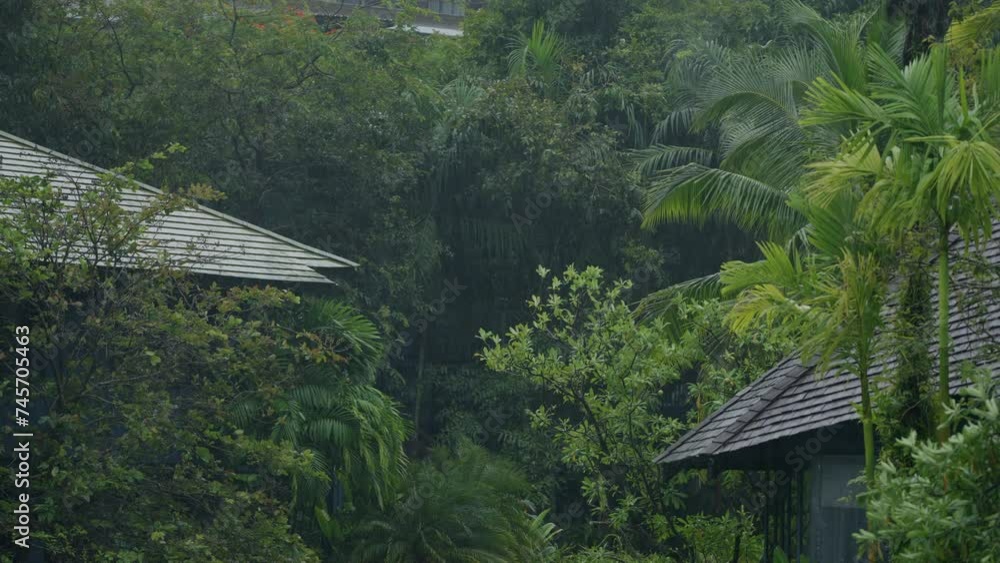 Rainfall in Krabi, Thailand during the tropical rainy season, showcasing the lush landscapes of Southeast Asia Rainfall in Krabi, Thailand during the tropical rainy season, showcasing the lush landscapes of Southeast Asia