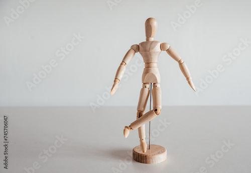 Hip external rotation on wooden model, piriformis syndrome photo