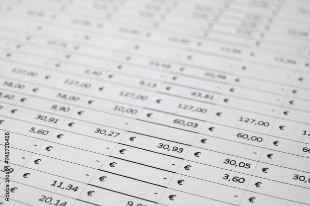 Table with indication of amounts in Euro, and blurred background. Budgets, expenses, earnings. Table with indication of amounts in Euro, and blurred background. Budgets, expenses, earnings.