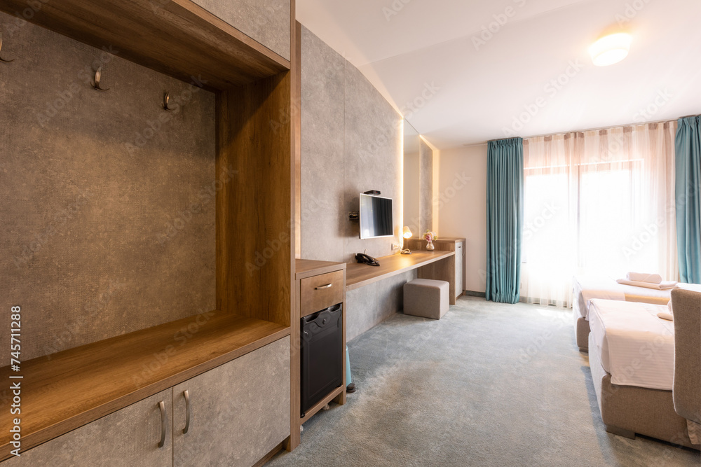 Interior of a double bed hotel bedroom in luxury hotel Interior of a double bed hotel bedroom in luxury hotel