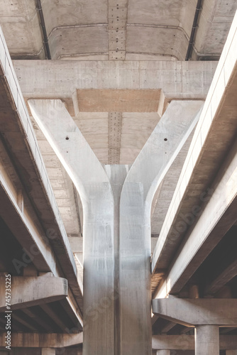 Geometric background of concrete foundation structure of the old elevated expressway in vertical frame, low angle view