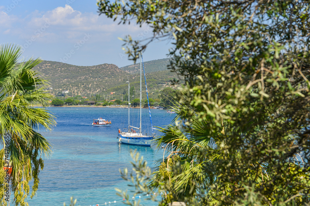 Türkiye - Izmir - Dikili; One of the most beautiful islands (Kalem Island). One of the most preferred places by holidaymakers. Sailing in the sea.