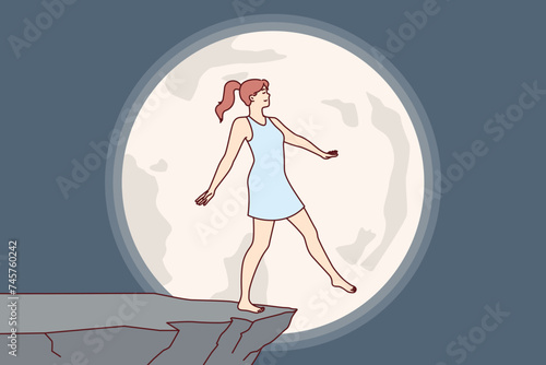 Woman experiences nightmare at night, imagining falling off cliff during full moon, due to presence of sleepwalking syndrome. Nightmare of young person at risk of injury due to psychological disorder photo