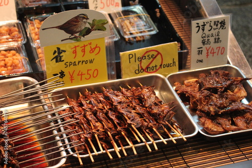 Special food at the market in Kyoto - Spatzen und andere Exotische Waren beim Market in Kyoto/ Japan photo