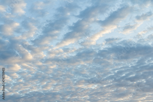 Blue sky background with tiny clouds. Nature abstract background for your design © King N