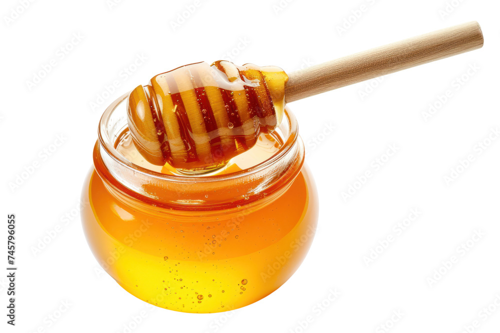 Honey dripping from honey dipper isolated on transparent background. Honey dripping from honey dipper isolated on transparent background.