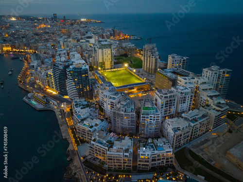 Drone evening view of apartment building in Sliema, Malta