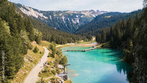 Aerial photo by drone of the Rosière lake and the forest in Courchevel in the Tarentaise valley in France