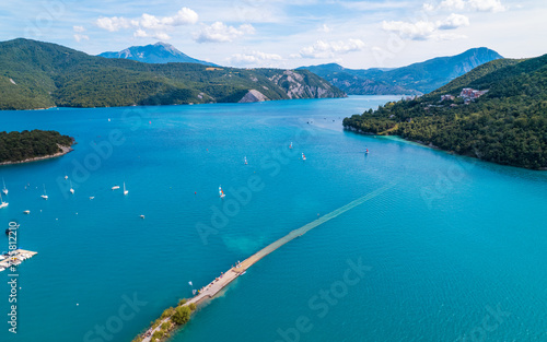 Aerial photo by drone of the Chanteloube bridge drowned in the turquoise waters of the Serre-Pon  on lake  located in the Hautes-Alpes  in France