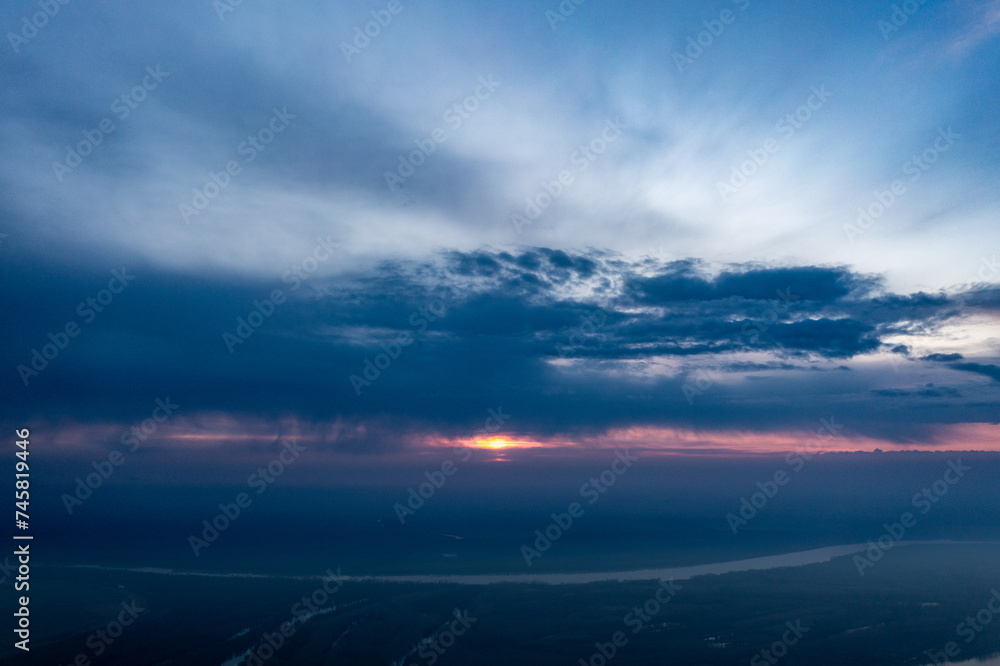 Dusk's Embrace: Aerial Capture of Danube River at Sunset in Romania