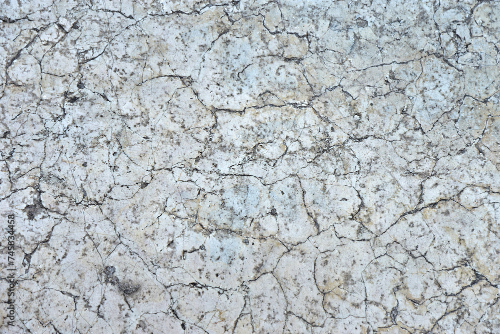 Concrete background with rough deep crack. Grey back. Grunge. marble