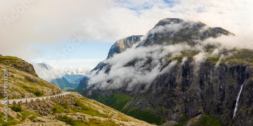 Panoramic View of Trollveggen Norway with clouds circling the mountains