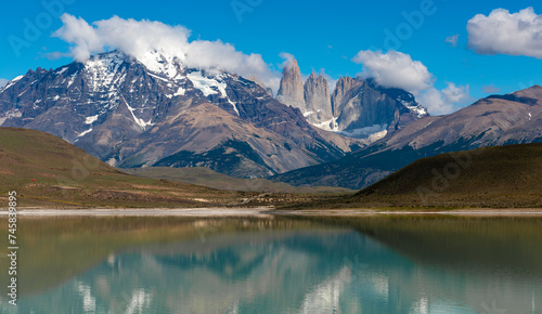 Torres del Paine peaks reflection in bitter lagoon (Laguna Amarga), Torres del Paine national park, Patagonia, Chile.