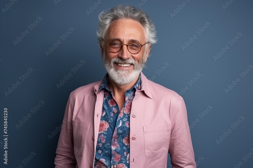 Portrait of a happy senior man with grey hair and glasses looking at camera Portrait of a happy senior man with grey hair and glasses looking at camera