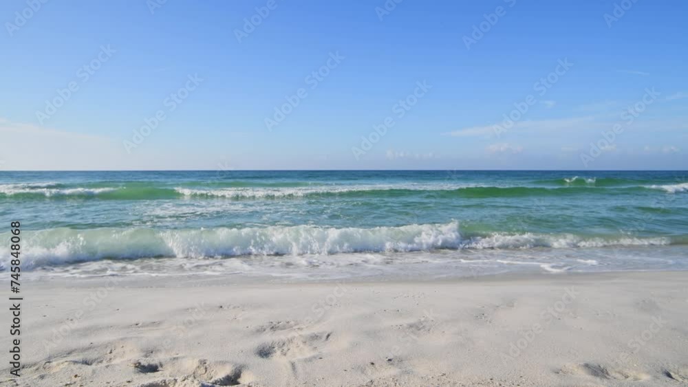 Emerald waters rolling up on pristine white sand beach in Florida Emerald waters rolling up on pristine white sand beach in Florida