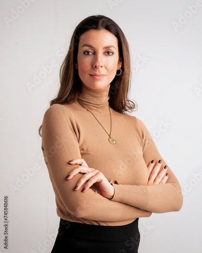 Brunette haired attractive woman portrait against isolated background