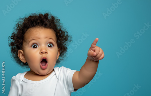 Surprised Baby Pointing At Background Copy Space