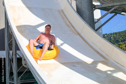 Fast descent on a water slide from a great height.