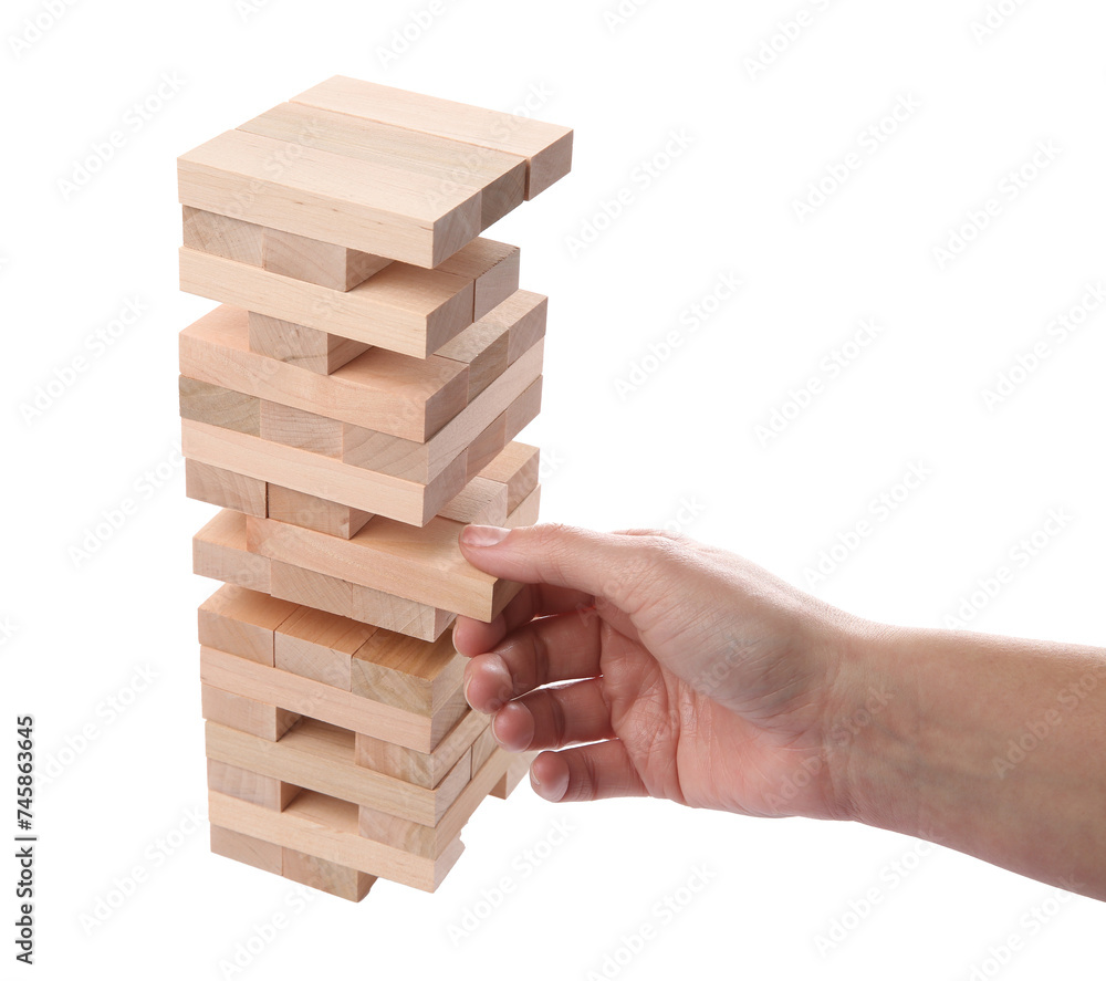 Woman playing Jenga on white background, closeup Woman playing Jenga on white background, closeup