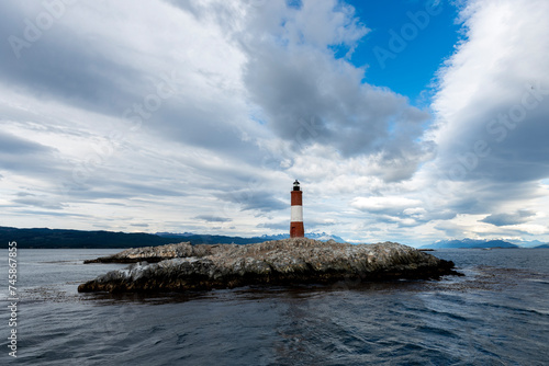 end of the world lighthouse in ushuaia argentina on an island of rocks in the beagle channel 