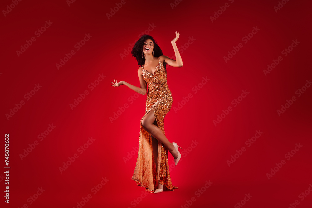 Photo of happy sophisticated lady in shining sparkling dress have fun festive event over red gradient color background Photo of happy sophisticated lady in shining sparkling dress have fun festive event over red gradient color background