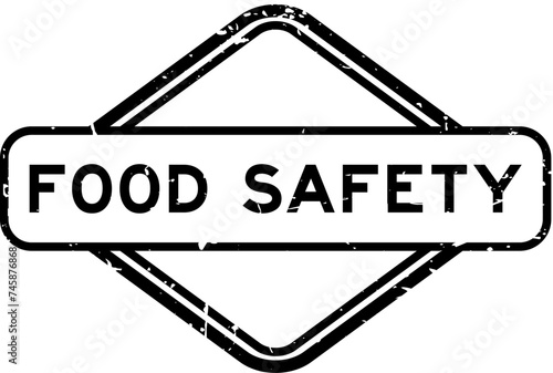Grunge black food safety word rubber seal stamp on white background