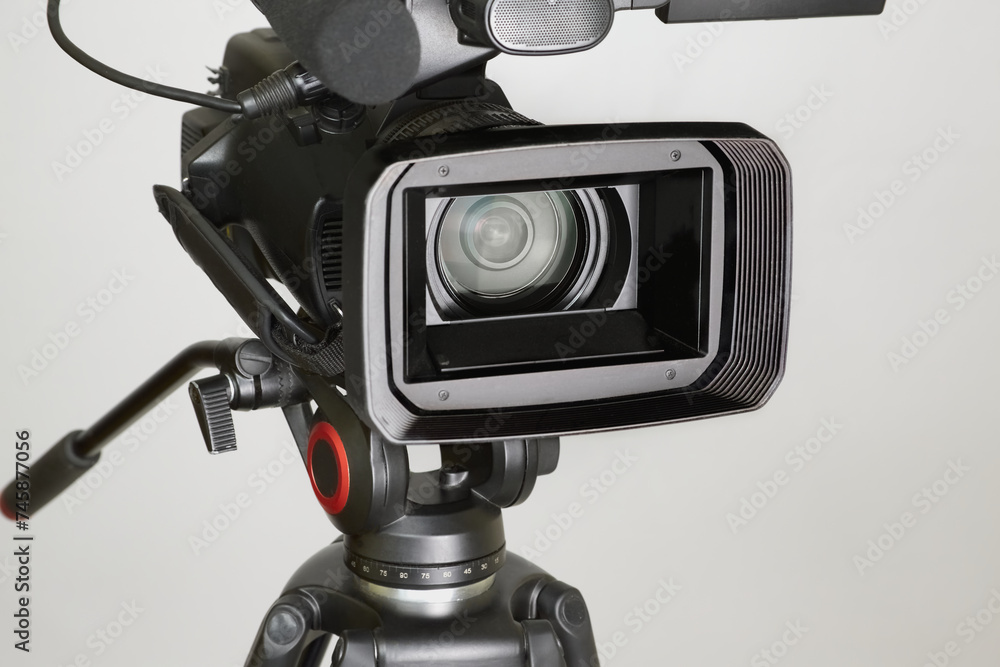 Video camera on a white background with a wide lens Video camera on a white background with a wide lens