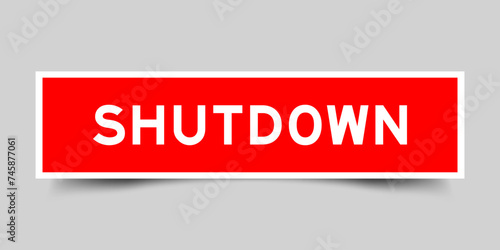 Square sticker label with word shutdown in red color on gray background