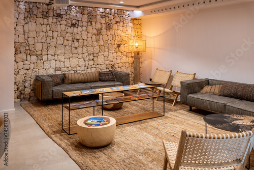 Empty living room with a warm atmosphere in a rustic hotel. Tourism concept