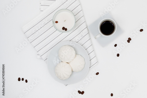 Background with assorted coffee: cups of espresso, coffee beans, powder and capsuleson white baclground. Space for copy. Top view. Flat lay photo