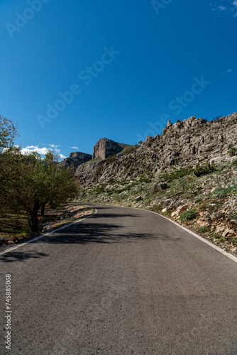 Idyllic landscape of a mountain road on a sunny day  Alicante  Costa Blanca  Spain - stock photo