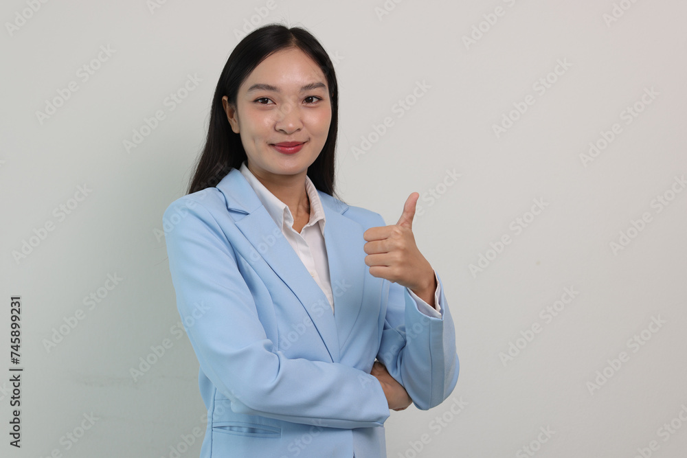 Cheerful beautiful Asian business woman smiling. Cheerful beautiful Asian business woman smiling.
