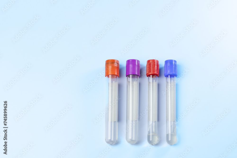 syringe for injectable medication on blue background syringe for injectable medication on blue background