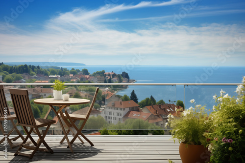 Sea view from the balcony. Sunny day  terrace with a wonderful view. The city by the sea. Vacation concept