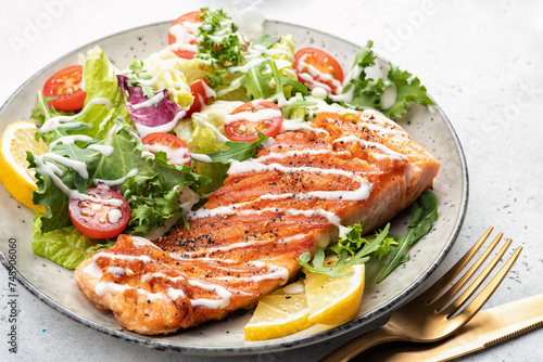 Grilled salmon and fresh salad