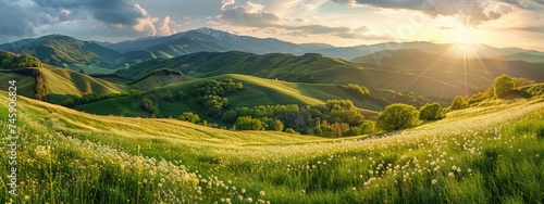 Springtime landscape in mountains. Panorama of beautiful countryside. grassy field and rolling hills. rural scenery