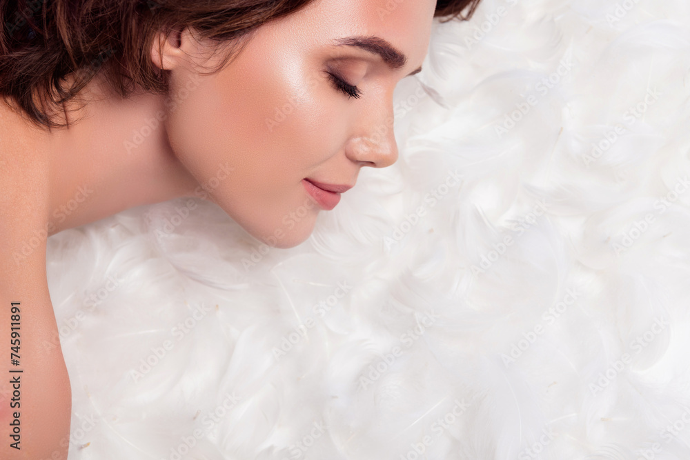 Closeup photo of relaxed young girlfriend sleeping bare closed eyes chilling on white feathers pillow mattress Closeup photo of relaxed young girlfriend sleeping bare closed eyes chilling on white feathers pillow mattress