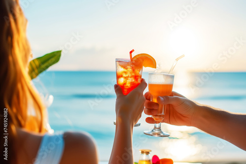 couple toasting drinks, sea horizon