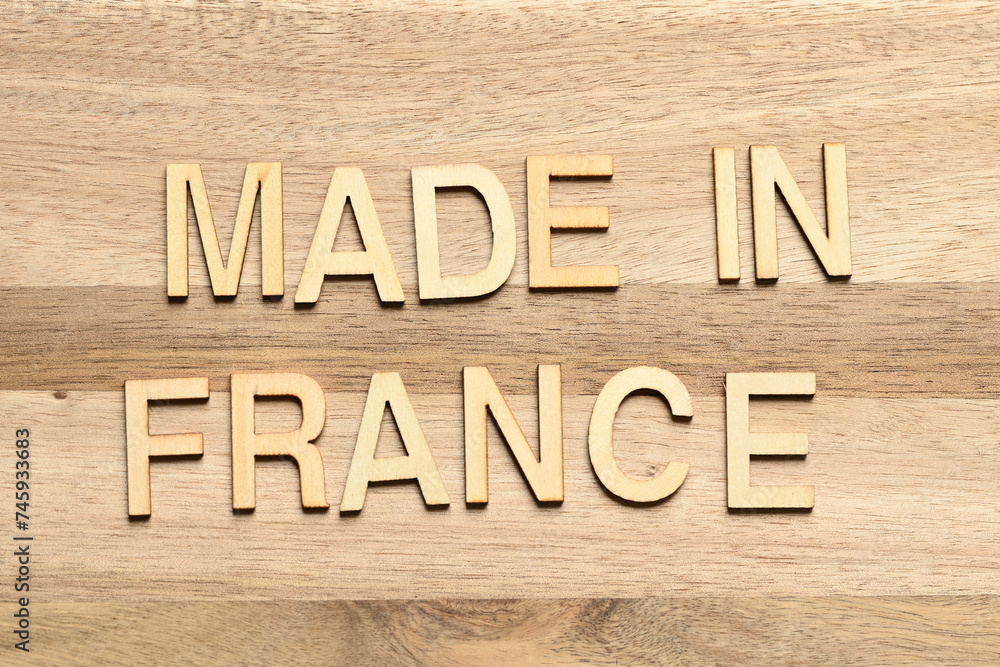 Made in France with wooden letters on textured background Made in France with wooden letters on textured background