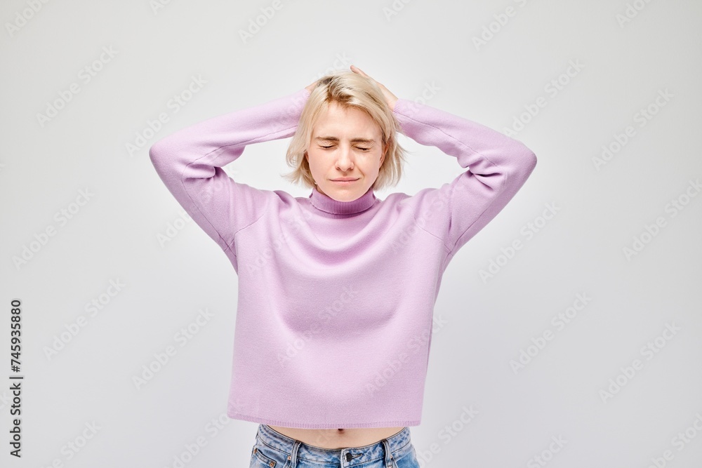 Portrait of tired girl with sad face feeling emotional burnout on white background. Nerves, stress, uncertainty concept. Portrait of tired girl with sad face feeling emotional burnout on white background. Nerves, stress, uncertainty concept.