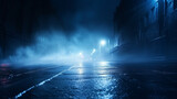 Dark street, wet asphalt, reflections of rays.