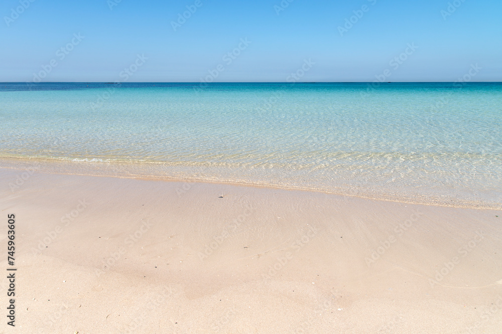 Transparent seawater at the sand beach in Udo Island