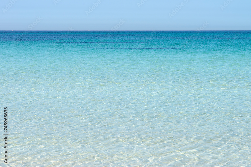 Transparent seawater at the sand beach in Udo Island