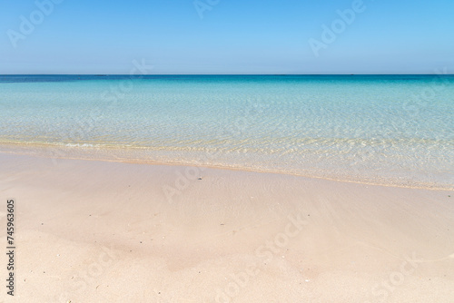Fototapeta Naklejka Na Ścianę i Meble -  Transparent seawater at the sand beach in Udo Island